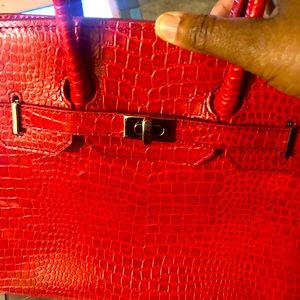 Red Birkin style snakeskin faux leather purse